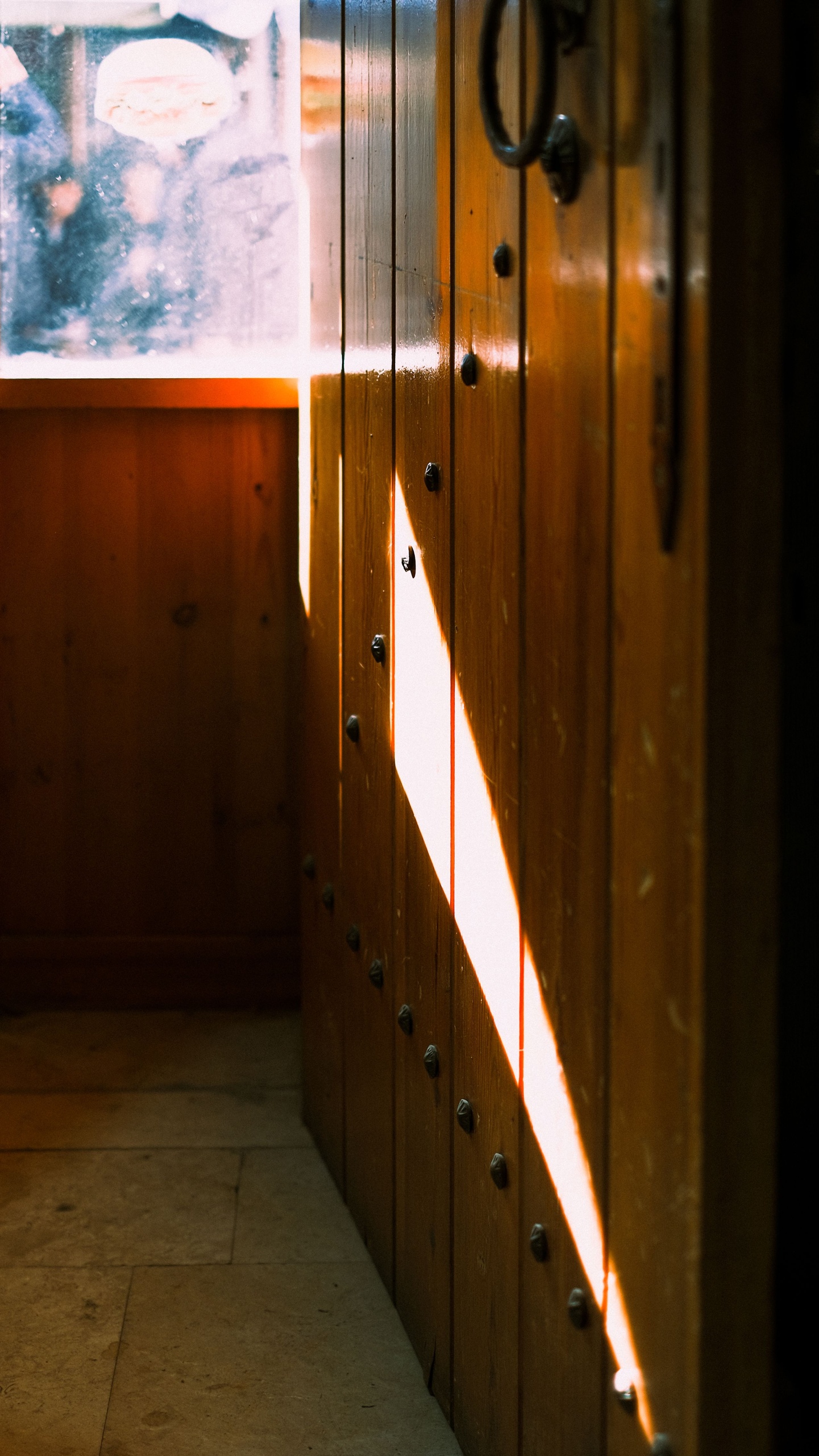 Warm Sunlight Casting Shadows on Wooden Walls